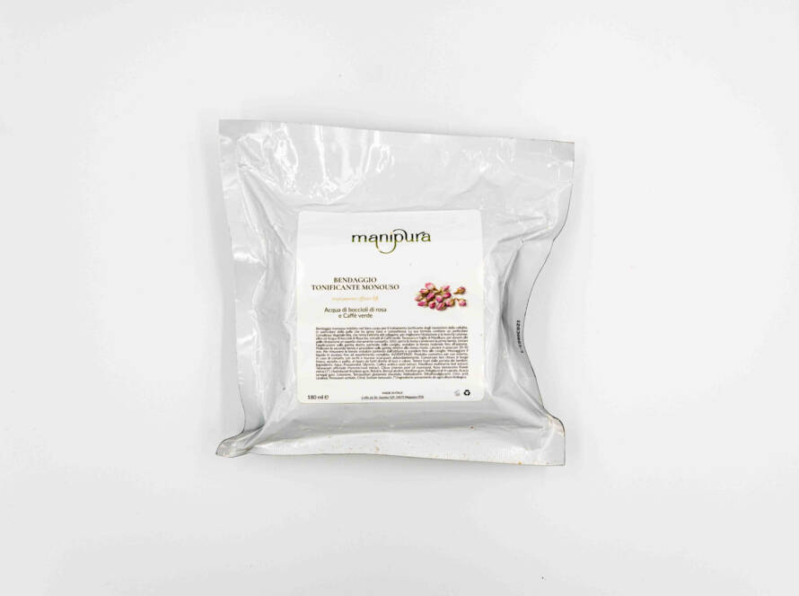 Busta del bendaggio tonificante monouso Manipura con etichetta visibile, fotografata su sfondo bianco.